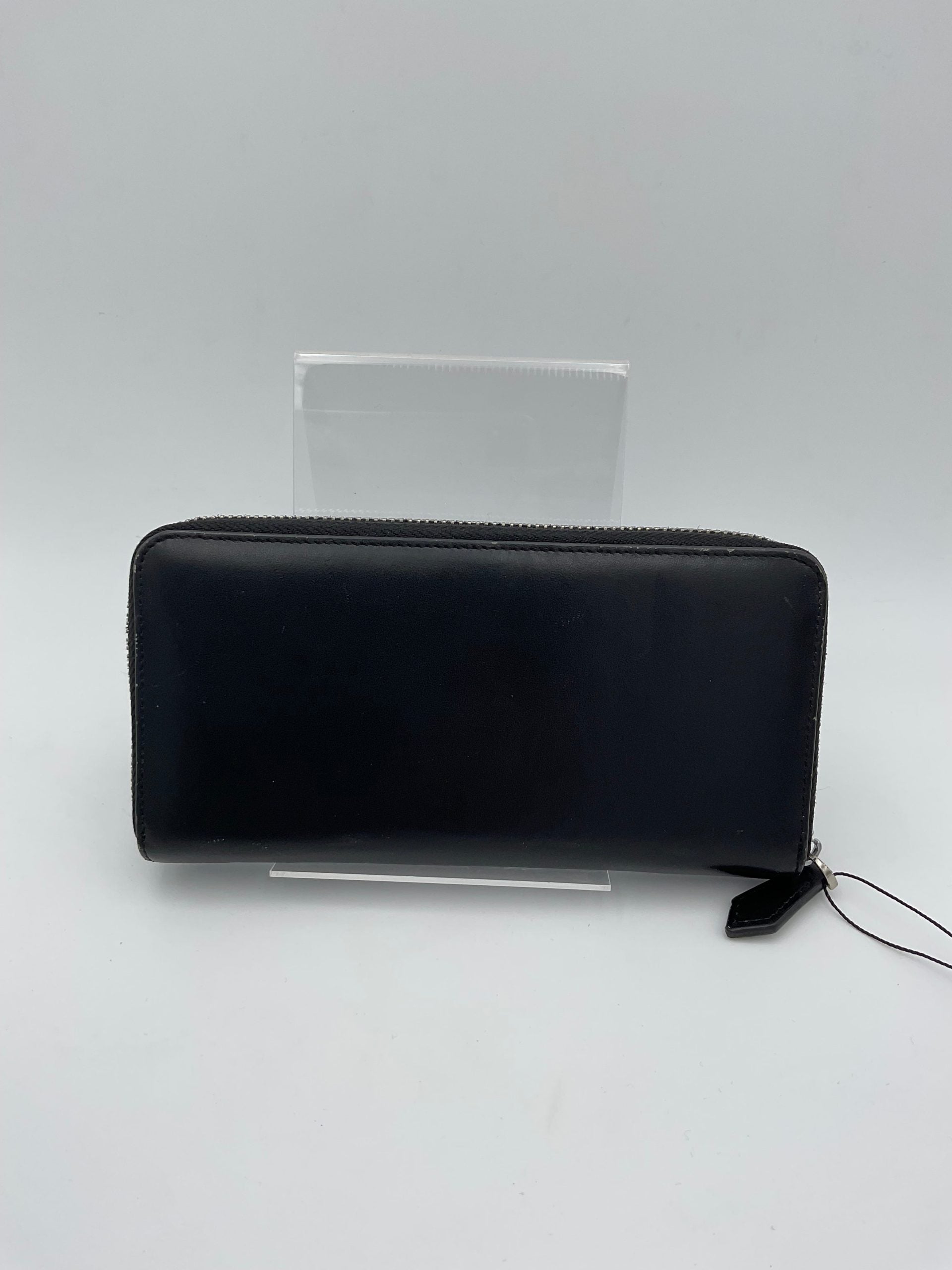 Discover the Fendi FENDI BUGS Wallet, a luxurious blend of calfskin and python, embodying exquisite craftsmanship and timeless elegance for the discerning collector.