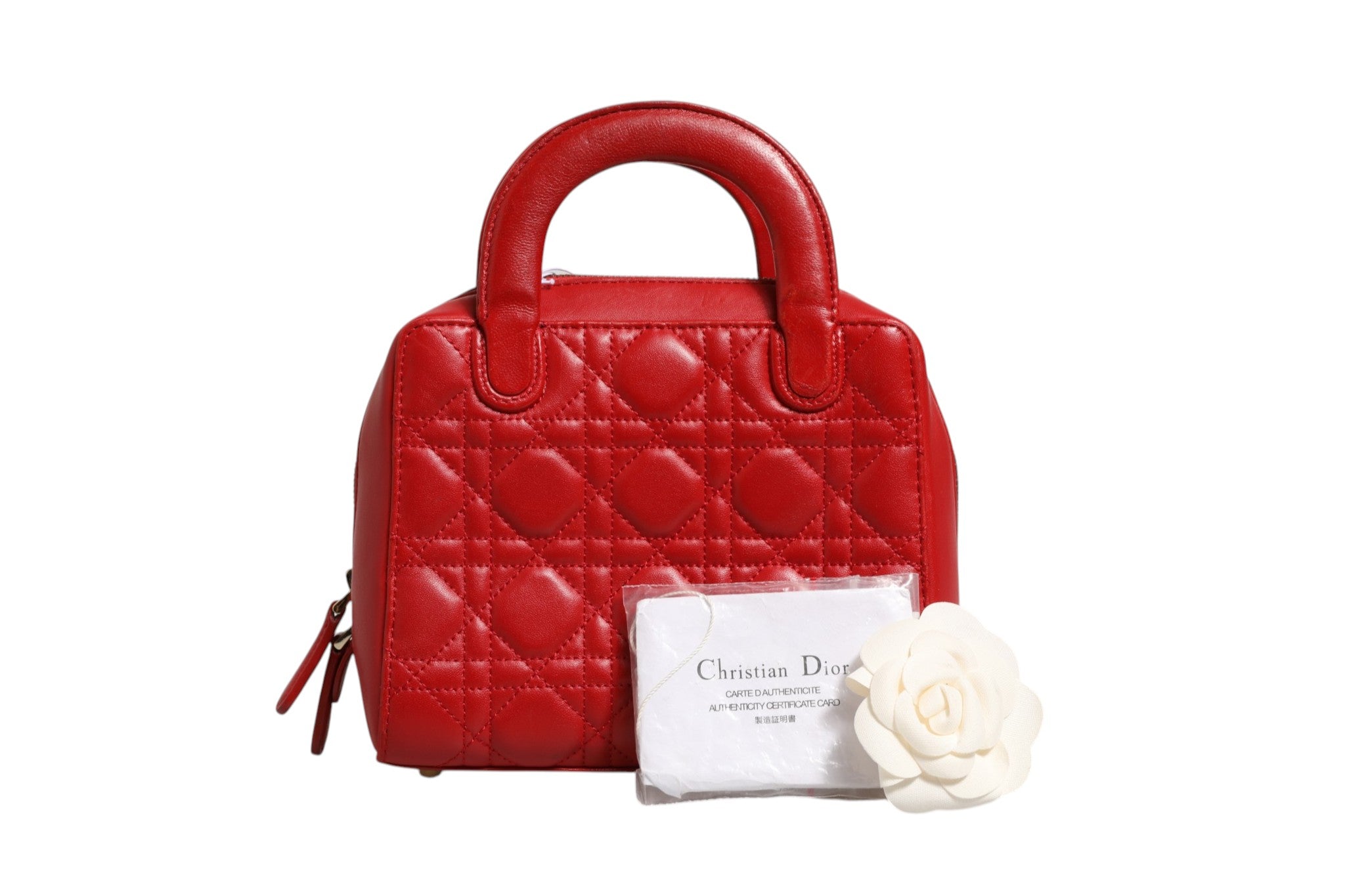 Indulge in the exquisite allure of the Christian Dior Small Dior Toujours Bag, a masterpiece of black Macrocannage calfskin that redefines luxury and sophistication.