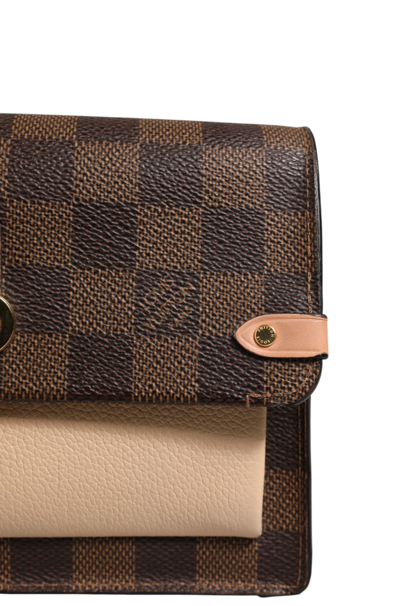 Indulge in the exquisite craftsmanship of the Louis Vuitton Damier Ebene Vavin Chain Wallet, a timeless accessory that embodies refined luxury and elegance.