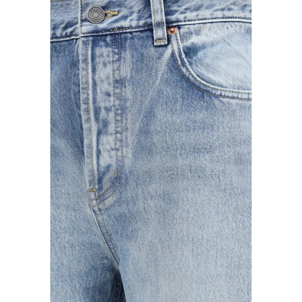 Experience the exquisite allure of Saint Laurent's Blue Cotton Cropped Jeans, a timeless blend of vintage sophistication and modern elegance, crafted for the discerning individual.
