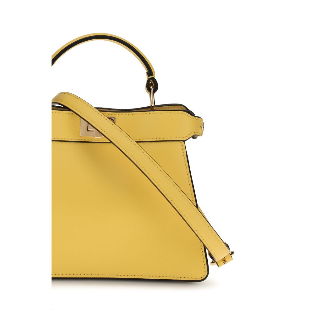 Indulge in the Fendi Bicolor Calf Leather Bos Taurus Handbag, a luxurious blend of silky calfskin and timeless elegance, perfect for the discerning connoisseur.