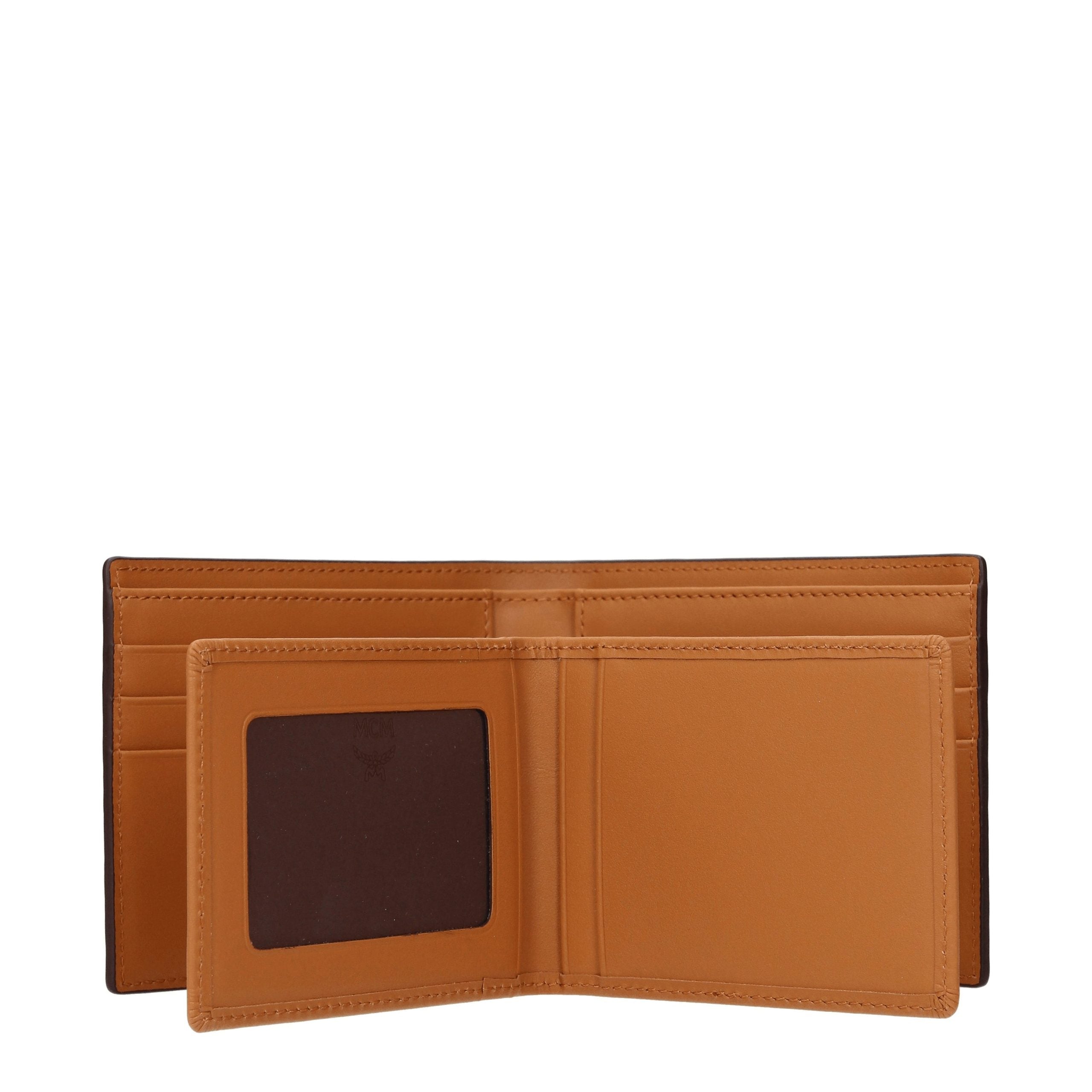 Experience the exquisite MCM Brown Fabric Wallet, a luxurious leather accessory that embodies sophistication and functionality, perfect for the discerning individual.