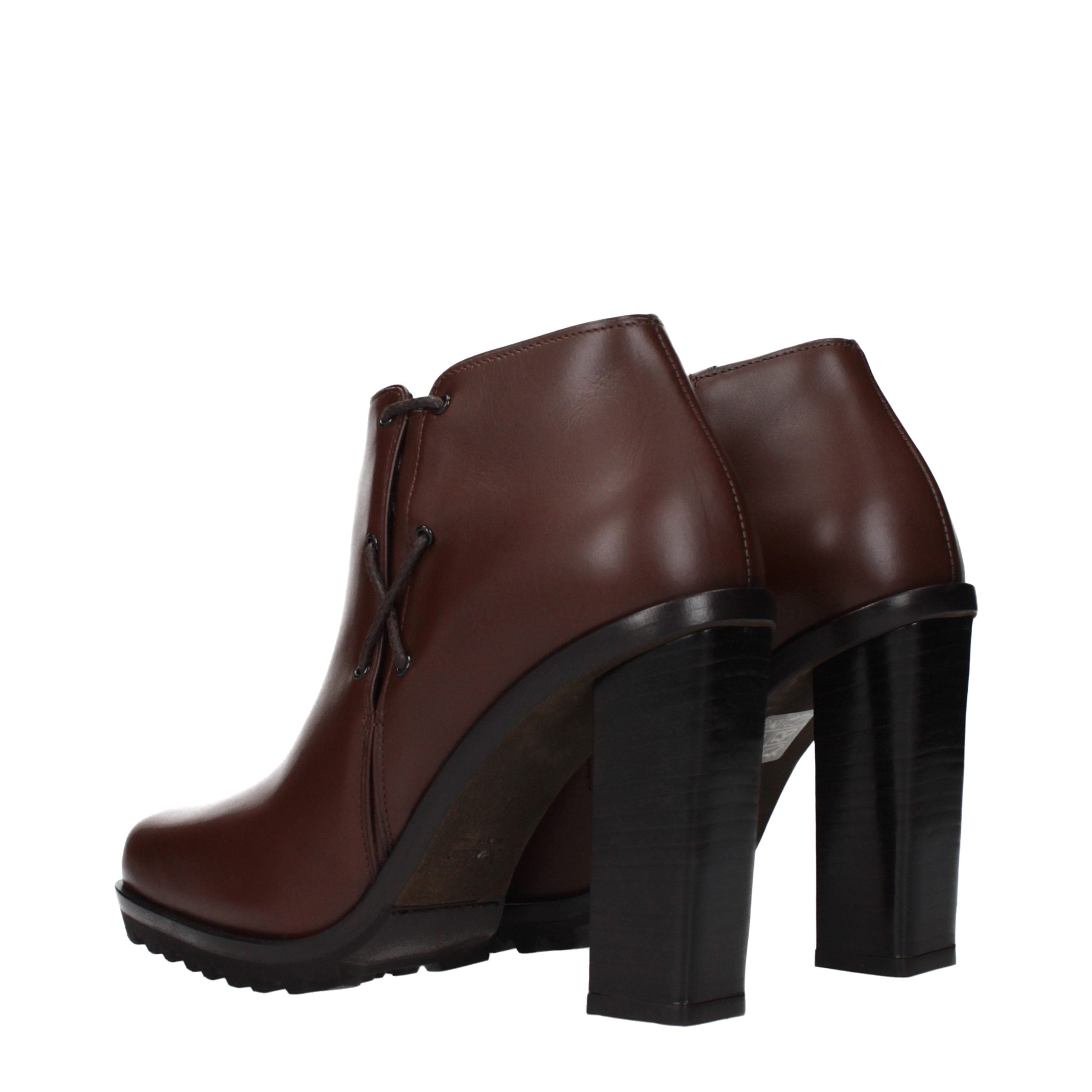 Elevate your style with Max Mara's Brown Leather Ankle Boots, a masterpiece of Italian craftsmanship that embodies timeless elegance and sophisticated allure.