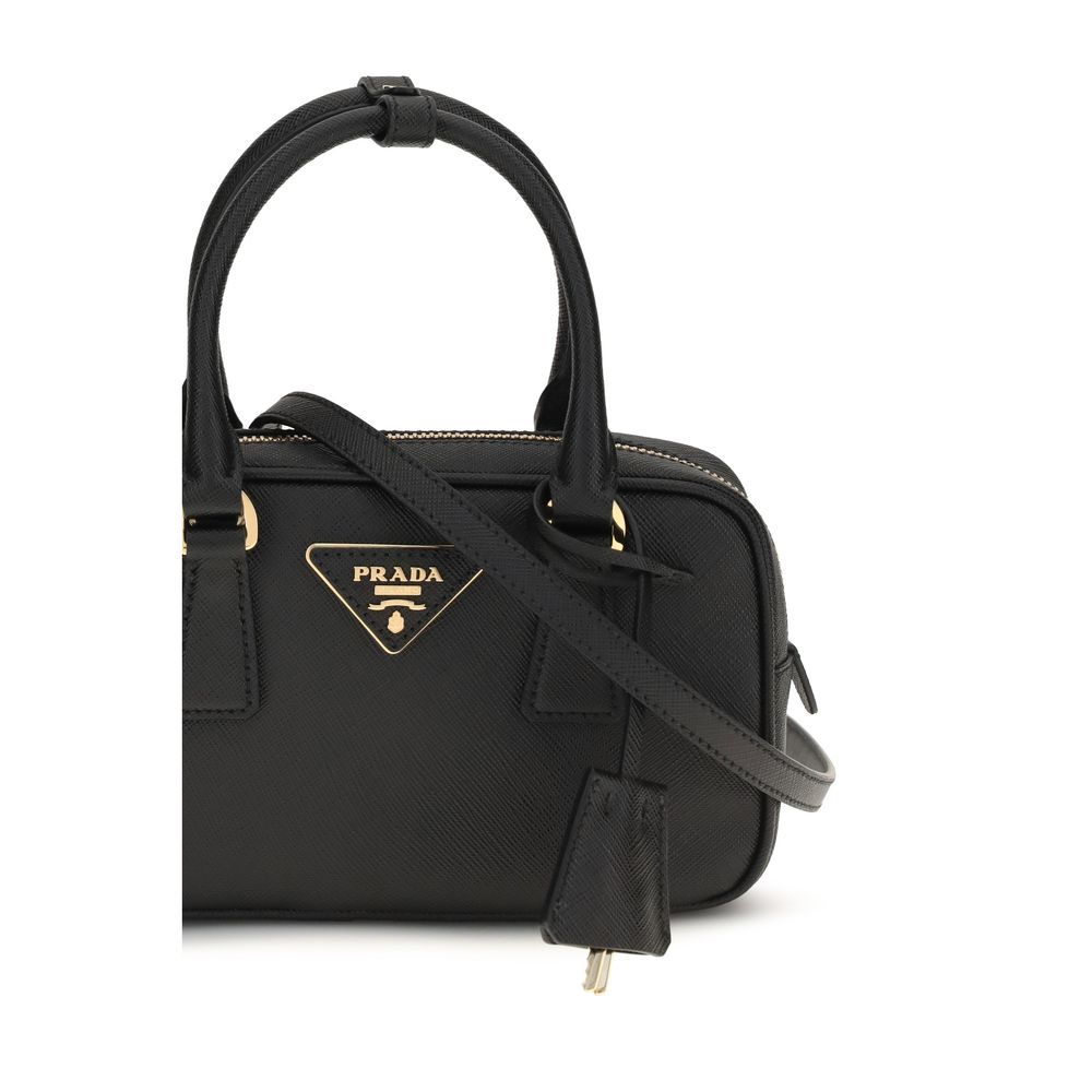 Discover the Prada Black Calf Leather Bos Taurus Shoulder Bag, a masterpiece of Saffiano leather and iconic design, embodying timeless elegance and sophisticated allure.