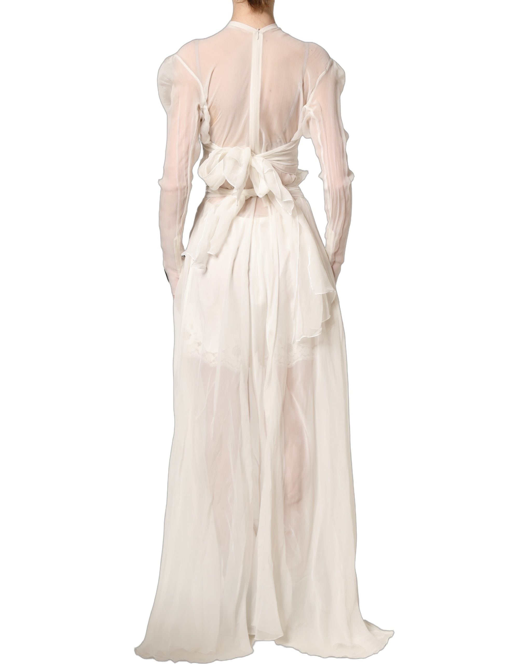Experience the epitome of elegance with the Dolce & Gabbana White Silk Sheer Draped Long Gown, a timeless masterpiece that embodies luxurious Italian craftsmanship.