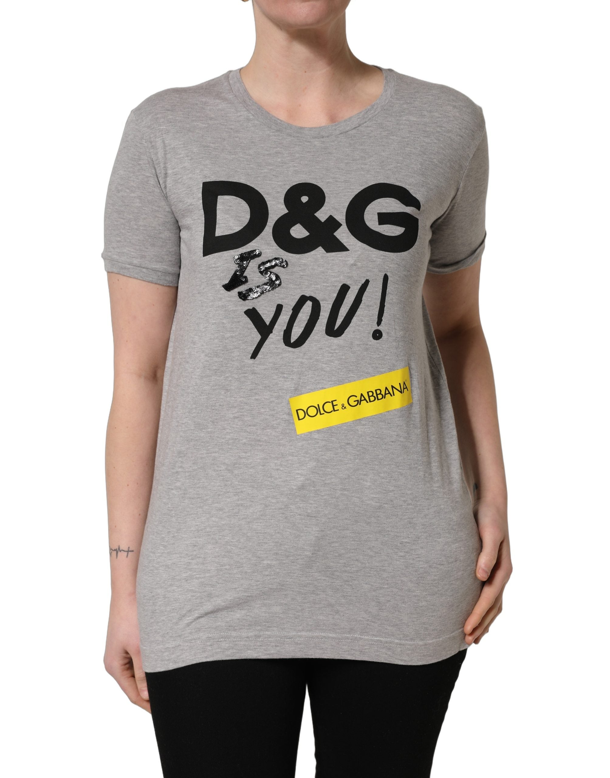 Elevate your wardrobe with the Dolce & Gabbana Gray Cotton Logo Printed Crew Neck T-shirt, a masterpiece of Italian craftsmanship that embodies effortless sophistication and modern allure.