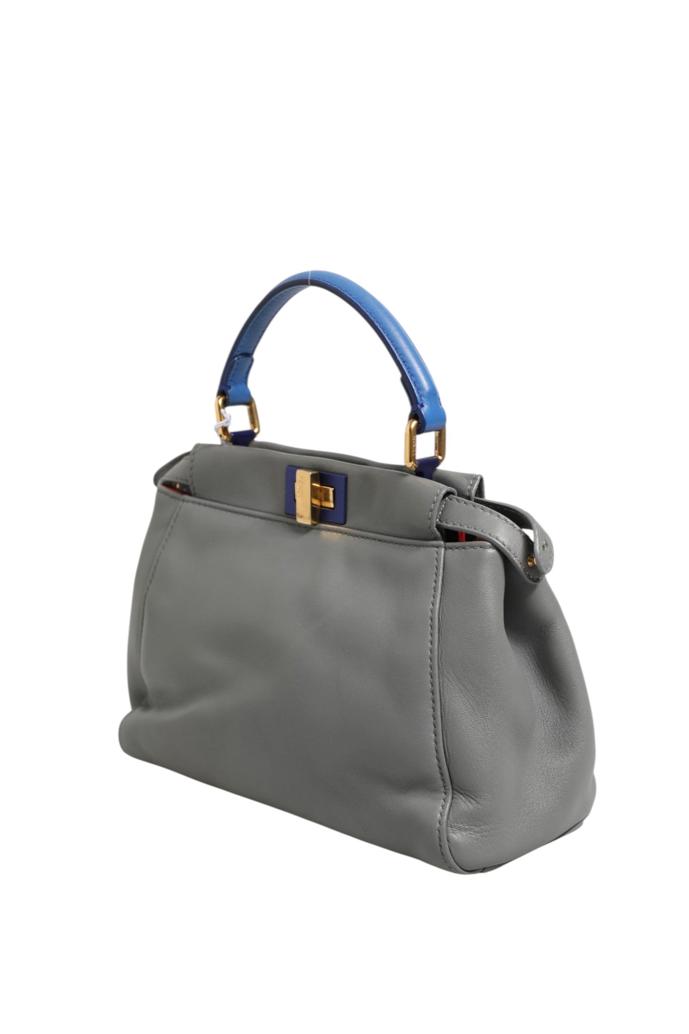 Discover the Fendi Mini Peekaboo Blue Grey, a masterpiece of Italian craftsmanship that embodies timeless elegance and sophistication for the discerning individual.