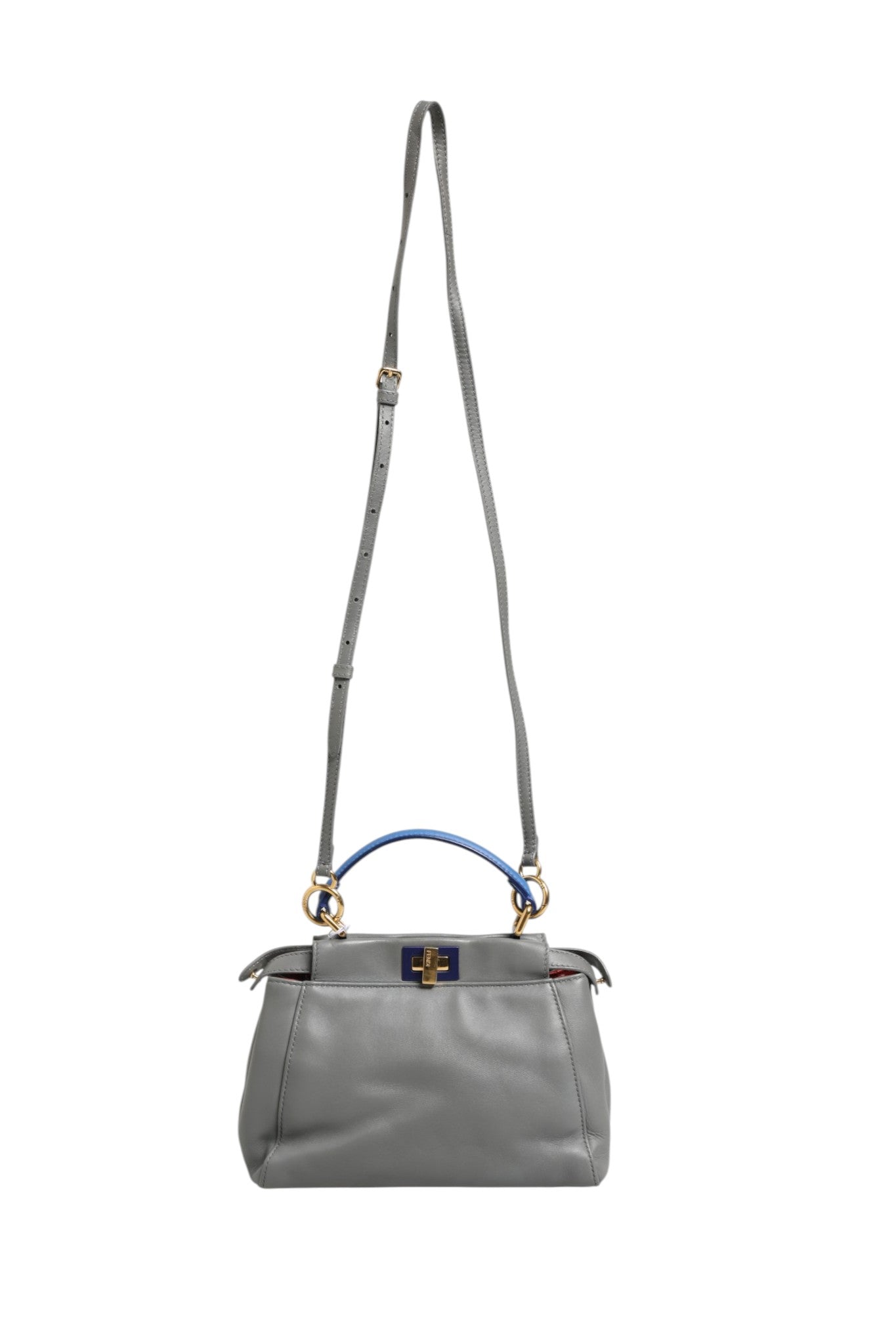Discover the Fendi Mini Peekaboo Blue Grey, a masterpiece of Italian craftsmanship that embodies timeless elegance and sophistication for the discerning individual.