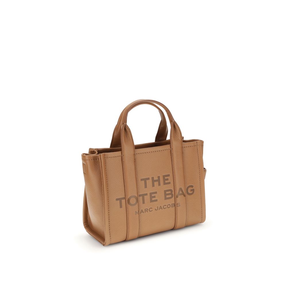 Elevate your style with the Marc Jacobs Brown Calf Leather Bos Taurus Handbag, a masterpiece of artisanal luxury and timeless elegance, perfect for any discerning individual.