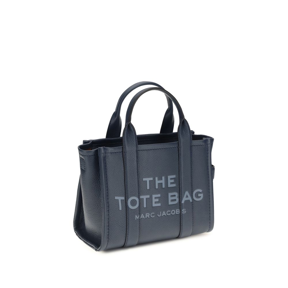 Indulge in the Marc Jacobs Blue Calf Leather Bos Taurus Handbag, where exquisite craftsmanship meets timeless elegance, perfect for the discerning fashionista.