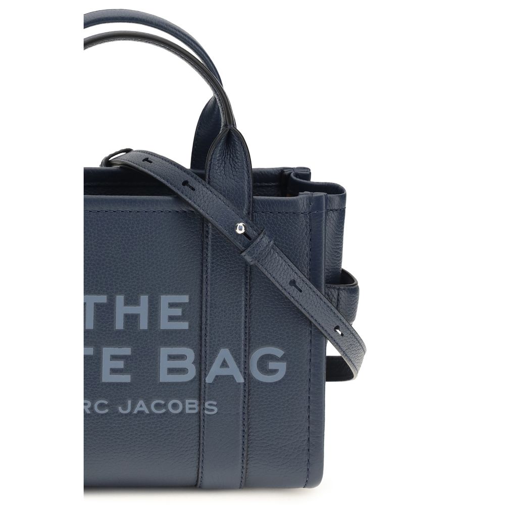 Indulge in the exquisite Marc Jacobs Blue Calf Leather Bos Taurus Handbag, a timeless blend of luxury and practicality, perfect for the discerning connoisseur.