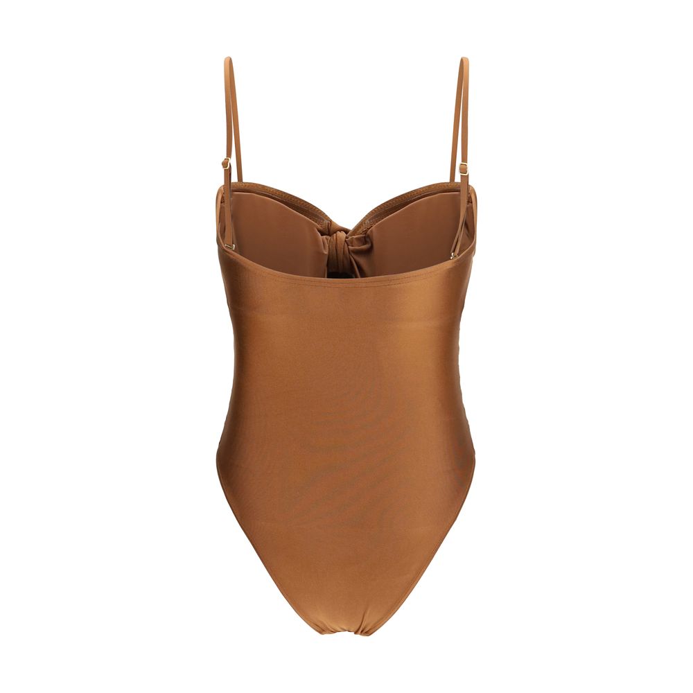 Indulge in the Zimmermann Aster Beige Polyamide One-Piece Swimsuit, where luxurious craftsmanship meets modern elegance, sculpting your silhouette for unforgettable moments.