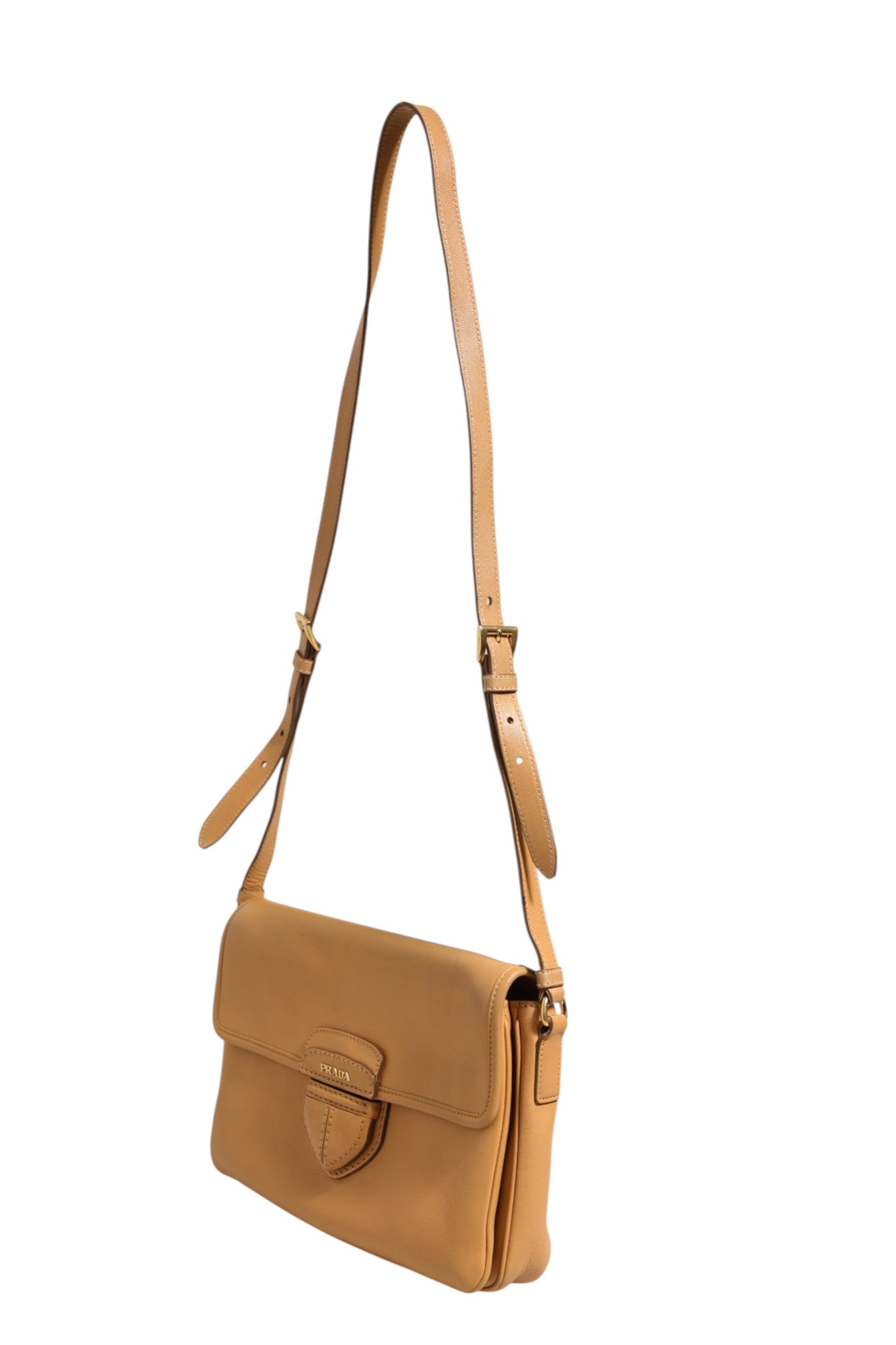 Elevate your style with the Prada Sidonie Beige Pebble Leather Shoulder Bag, a masterpiece of craftsmanship that embodies timeless elegance and sophistication.