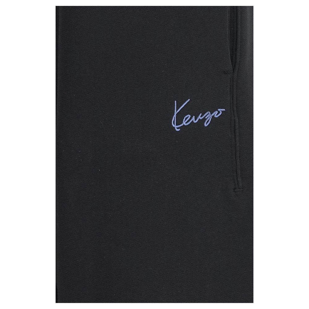 Indulge in the Kenzo Black Cotton Joggers, crafted from the finest unbrushed cotton, embodying timeless luxury and effortless elegance for the discerning individual.