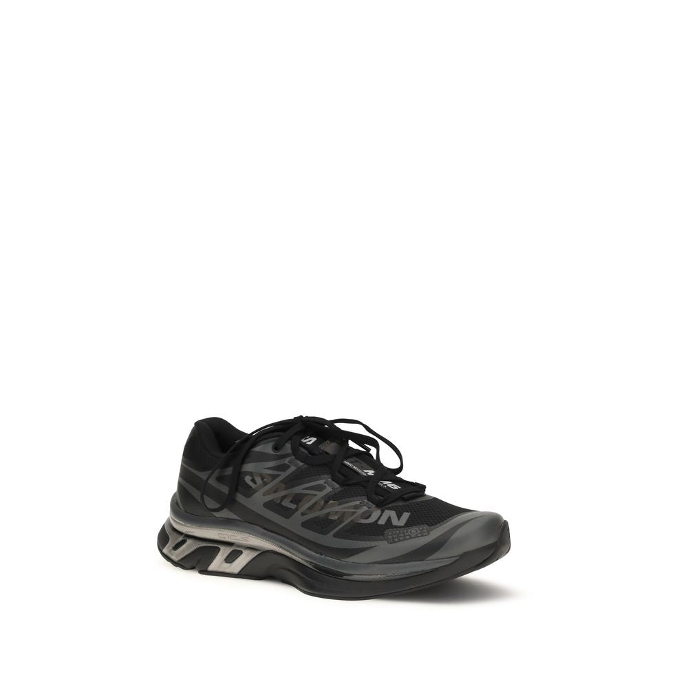 Indulge in the MM6 Black Polyamide Athletic Sneakers, where urban sophistication meets exceptional craftsmanship, perfect for the discerning modern trailblazer.
