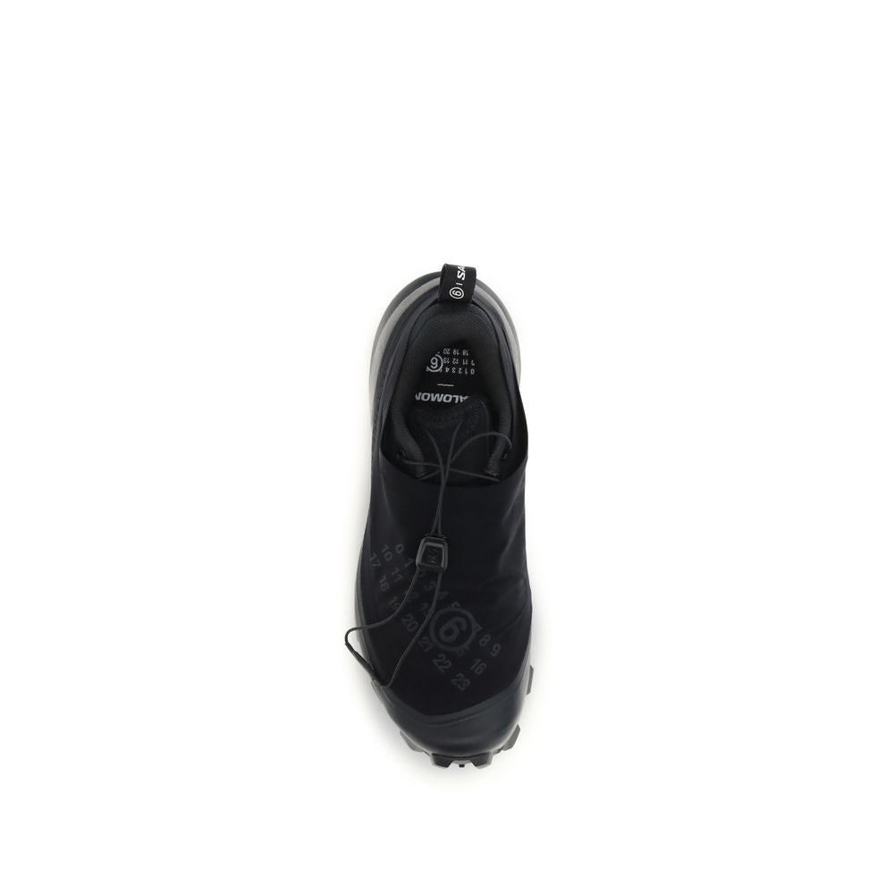Experience the allure of MM6 Black Polyamide Athletic Sneakers, crafted from recycled materials for an exquisite blend of luxury and sustainability in modern fashion.