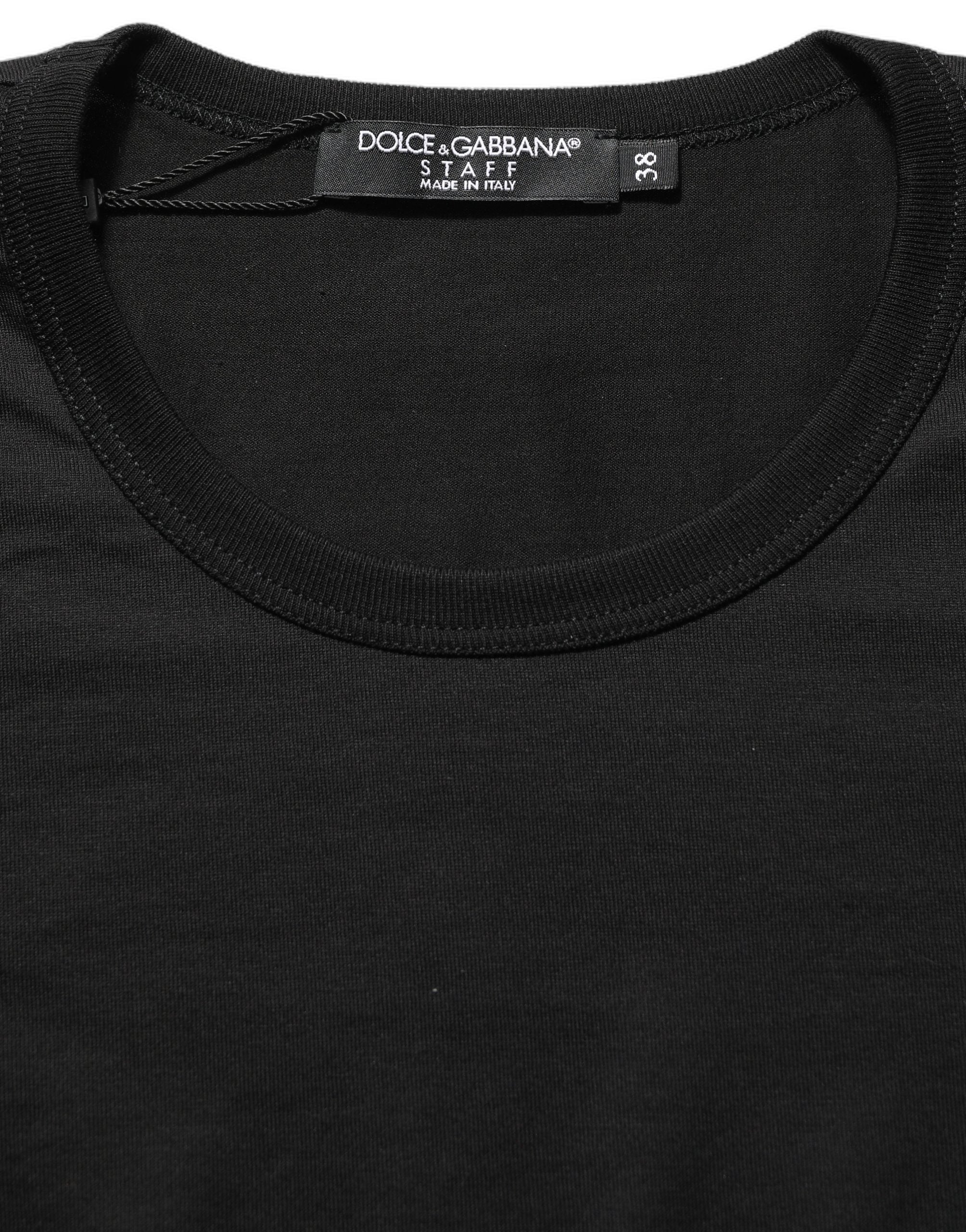 Elevate your wardrobe with the Dolce & Gabbana Black Cotton Round Neck T-shirt, a timeless piece of Italian craftsmanship that embodies luxury and effortless elegance.