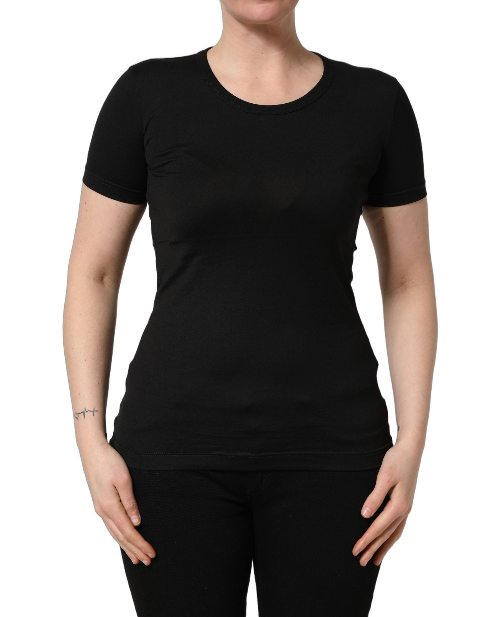 Elevate your wardrobe with the Dolce & Gabbana Black Cotton Round Neck T-shirt, a timeless piece of Italian craftsmanship that embodies effortless luxury and sophistication.