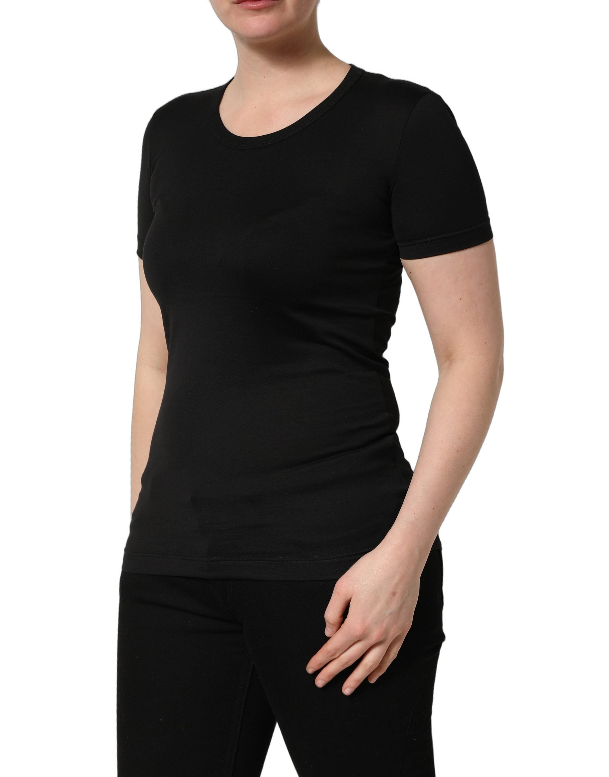 Elevate your wardrobe with the Dolce & Gabbana Black Cotton Round Neck T-shirt, a timeless Italian essential that embodies luxury and effortless elegance.
