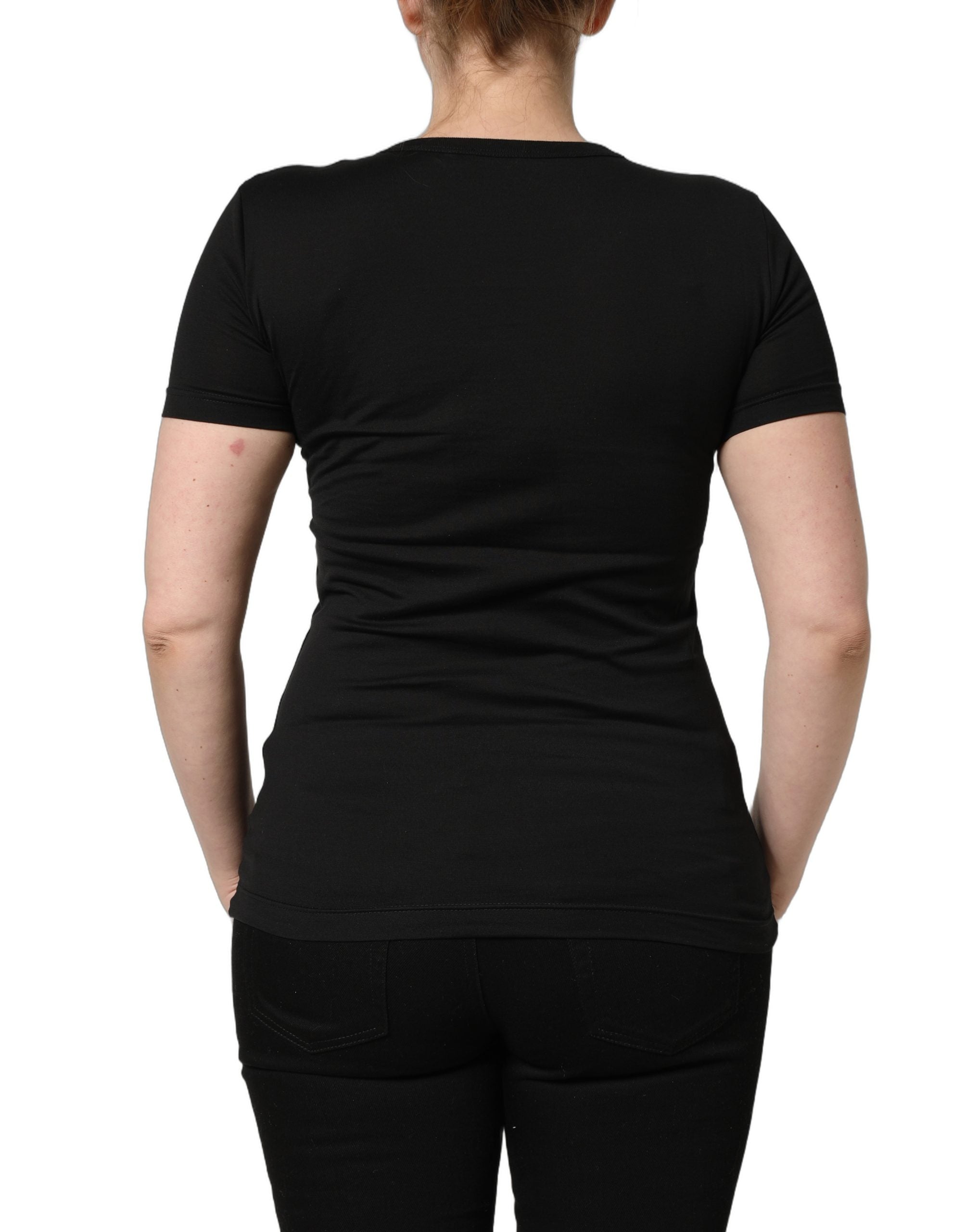 Elevate your wardrobe with the Dolce & Gabbana Black Cotton Round Neck T-shirt, a timeless essential crafted in Italy, merging luxury with effortless elegance.
