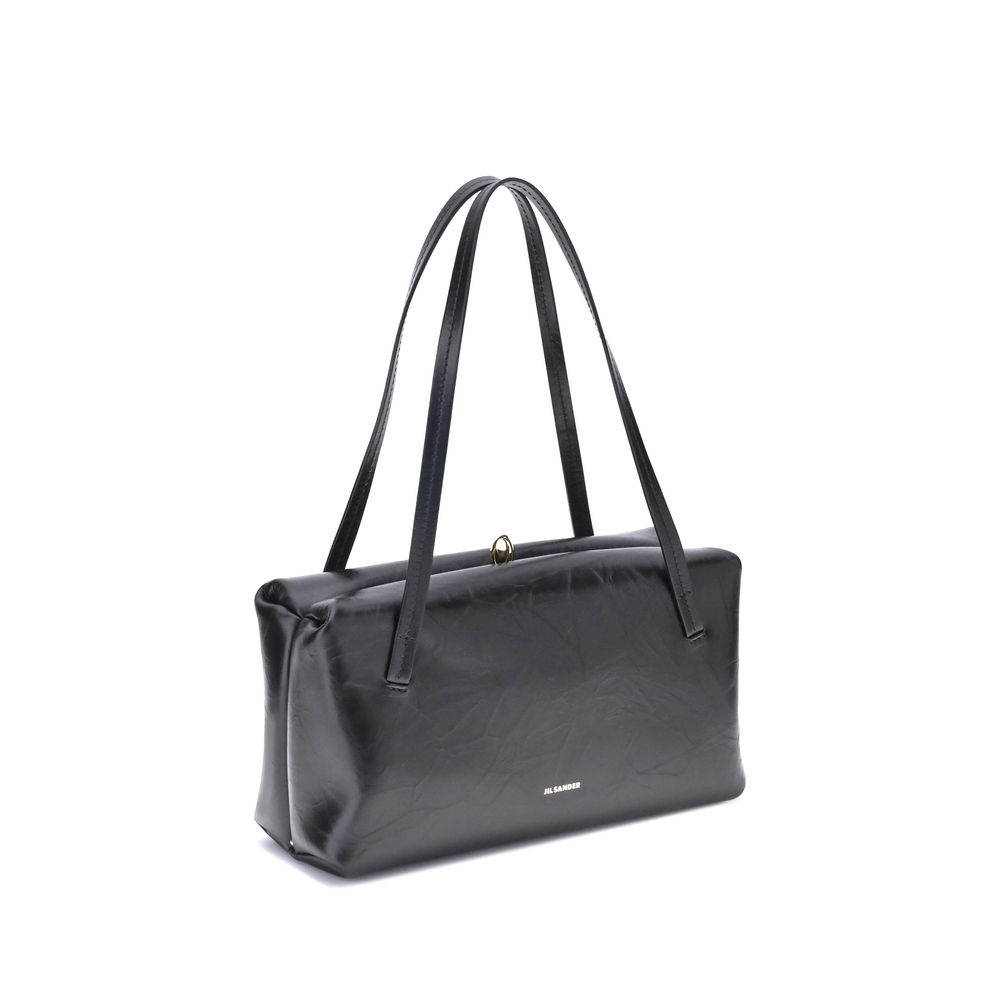 Discover the Jil Sander Black Calf Leather Bos Taurus Shoulder Bag, a masterpiece of exquisite craftsmanship and timeless elegance, perfect for those who embody luxury.