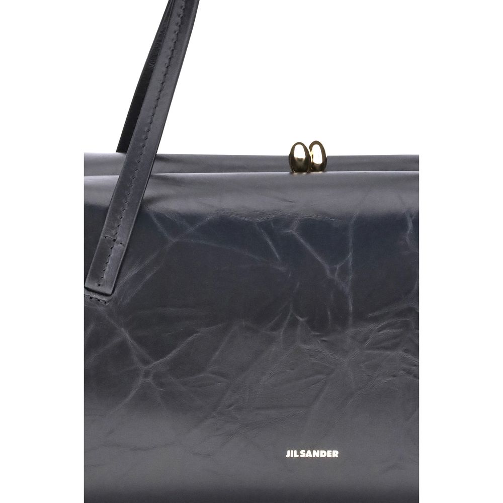 Discover the Jil Sander Black Calf Leather Bos Taurus Shoulder Bag, a masterpiece of exquisite craftsmanship and timeless elegance, perfect for the discerning individual.
