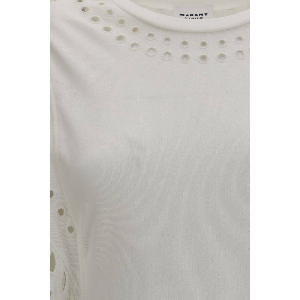 Indulge in the romantic allure of the Isabel Marant Étoile White Cotton Casual Dress, where organic cotton and exquisite broderie anglaise create timeless elegance for the discerning individual.
