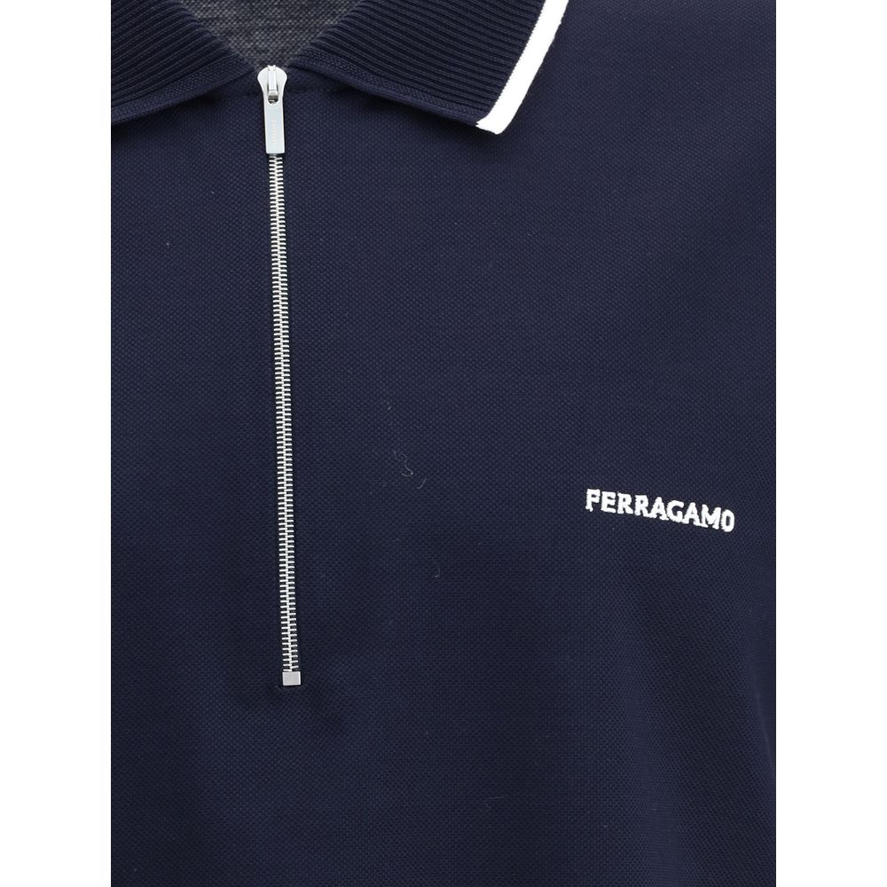 Discover the Ferragamo Blue Cotton Polo Shirt, a masterpiece of 100% cotton, where luxury craftsmanship meets timeless elegance for the discerning individual.