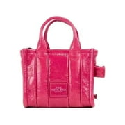 Elevate your style with the Marc Jacobs The Shiny Crinkle Micro Tote, a magenta patent leather masterpiece that embodies luxury and sophistication for the discerning individual.