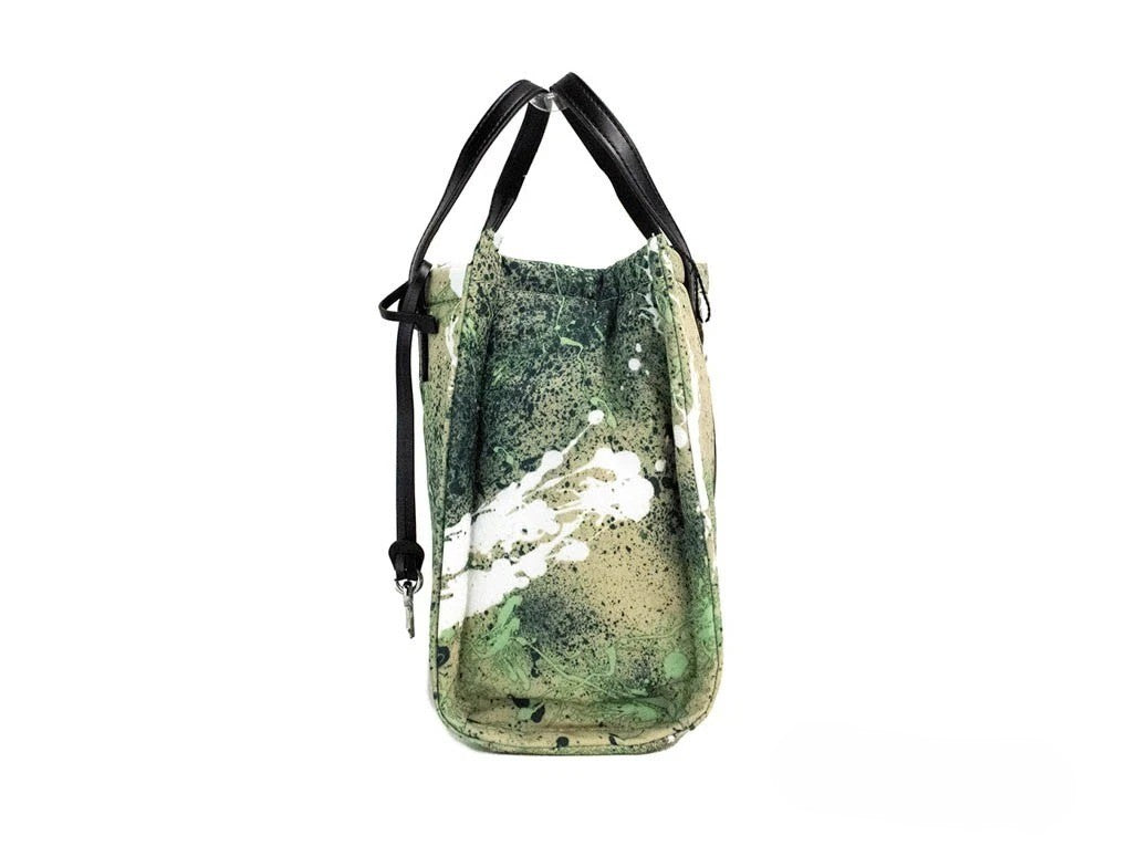 Elevate your style with the Marc Jacobs Mini Green Multi Splatter Paint Print Nylon Crossbody Tote, a masterpiece of vibrant artistry and exquisite craftsmanship, perfect for any occasion.