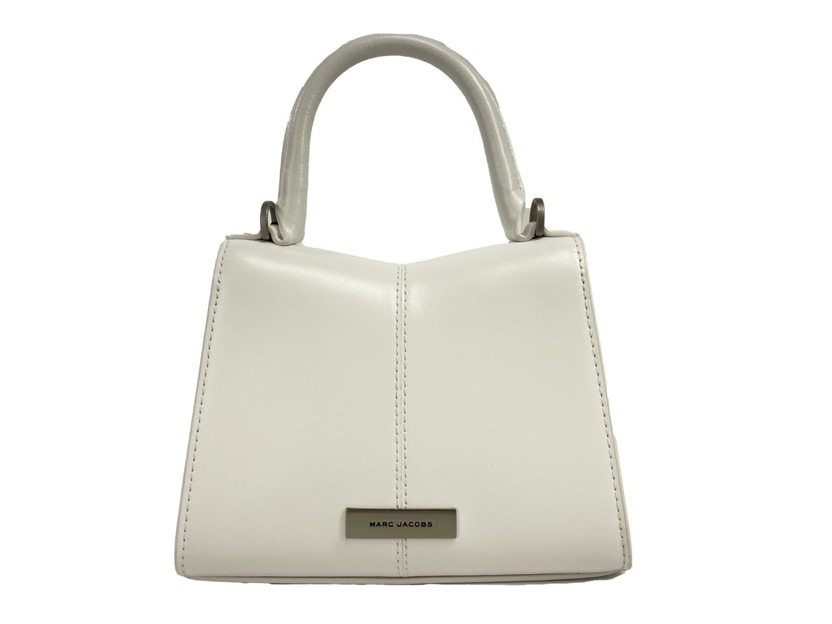Discover the Marc Jacobs St Marc Mini Top Handle Satchel, a premium leather masterpiece that embodies sophistication and versatility for every occasion.