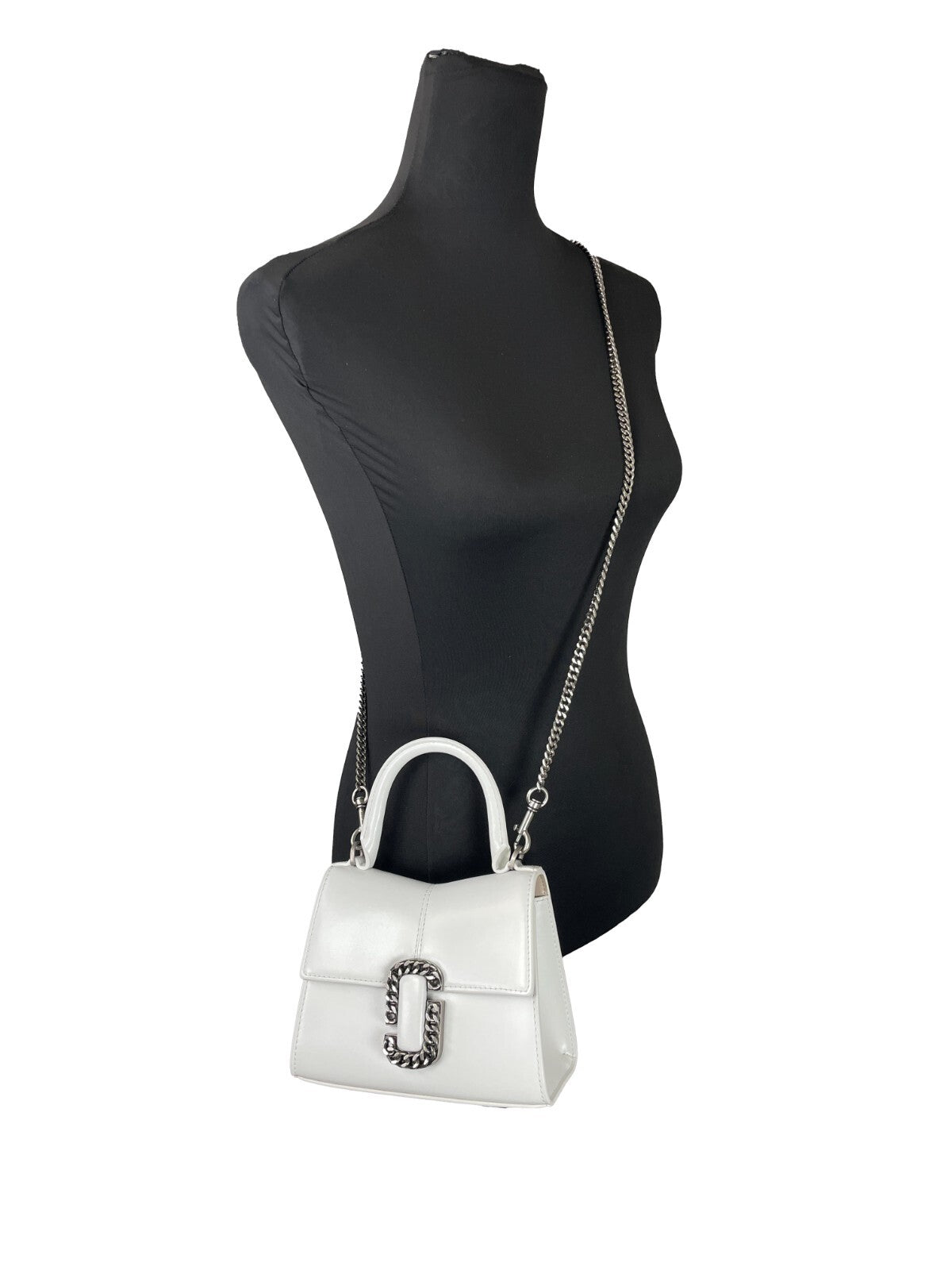 Discover the Marc Jacobs St Marc Mini Top Handle Satchel, a premium leather masterpiece that embodies sophistication and versatile elegance for every occasion.