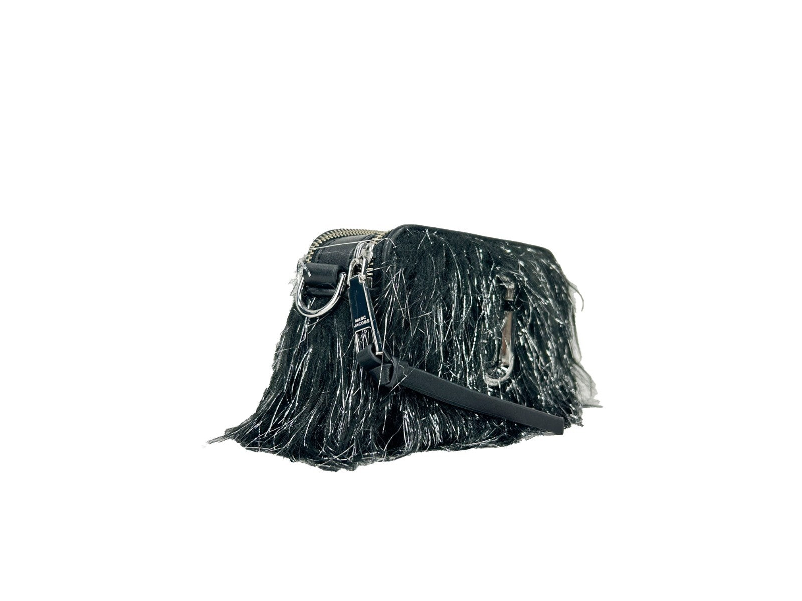 Indulge in the exquisite Marc Jacobs The Snapshot Creature Crossbody Bag, a luxurious fusion of fur and leather, perfect for elevating any ensemble with timeless elegance.