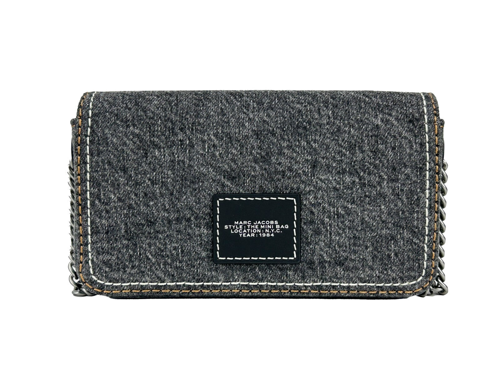 Indulge in the elegance of Marc Jacobs The Denim Chain Mini Bag, where soft denim meets refined craftsmanship, perfect for elevating any sophisticated ensemble.