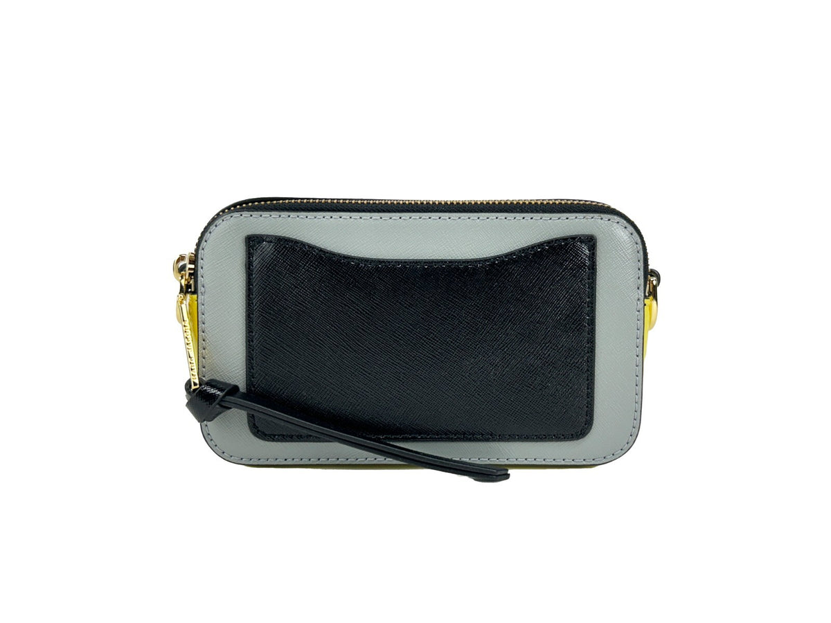 Elevate your style with the Marc Jacobs The Snapshot New York Crossbody Bag, a luxurious blend of premium leather and exquisite craftsmanship, perfect for any occasion.