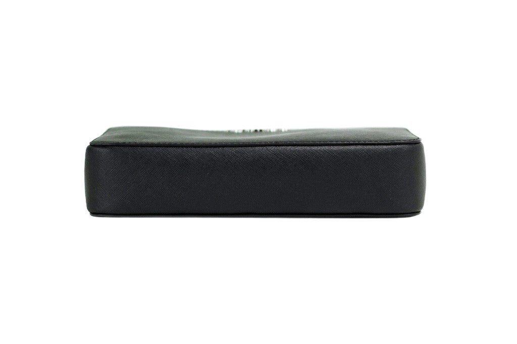 Discover the Michael Kors Jet Set Large East West Black Saffiano Leather Crossbody Handbag, a timeless blend of luxury and functionality, perfect for the discerning individual.