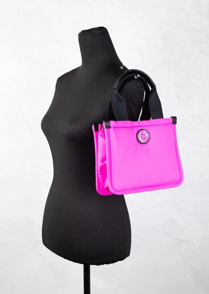 Discover the Marc Jacobs Small Neon Fuchsia Nylon Fabric Tote, a masterpiece of exceptional craftsmanship that elevates your style with vibrant elegance and practical luxury.