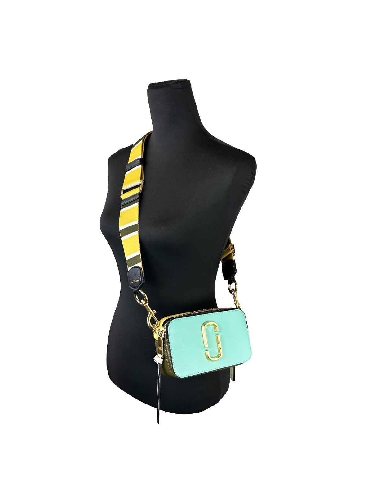 Discover the Marc Jacobs The Snapshot Crossbody Bag, a luxurious leather masterpiece that embodies elegance and versatility for the discerning individual.