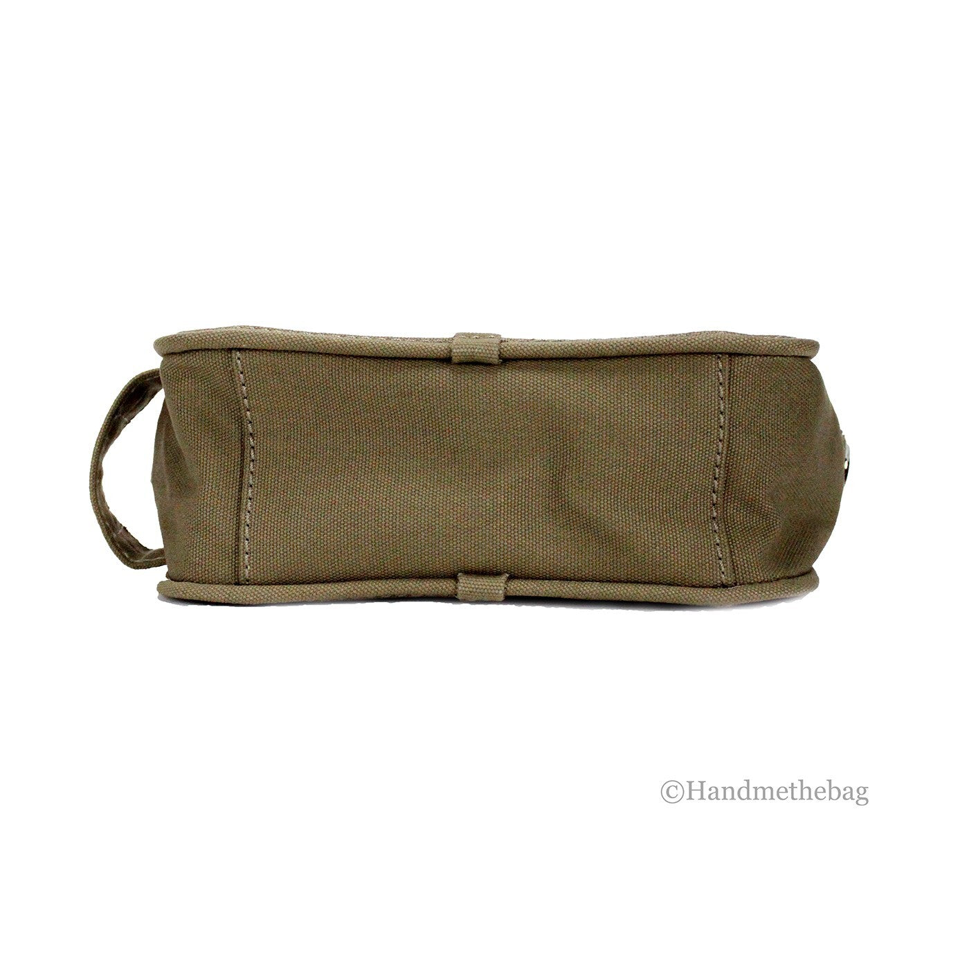 Elevate your style with Marc Jacobs The Camera Bag, a stunning blend of premium canvas and cotton, embodying timeless elegance and sophisticated versatility.