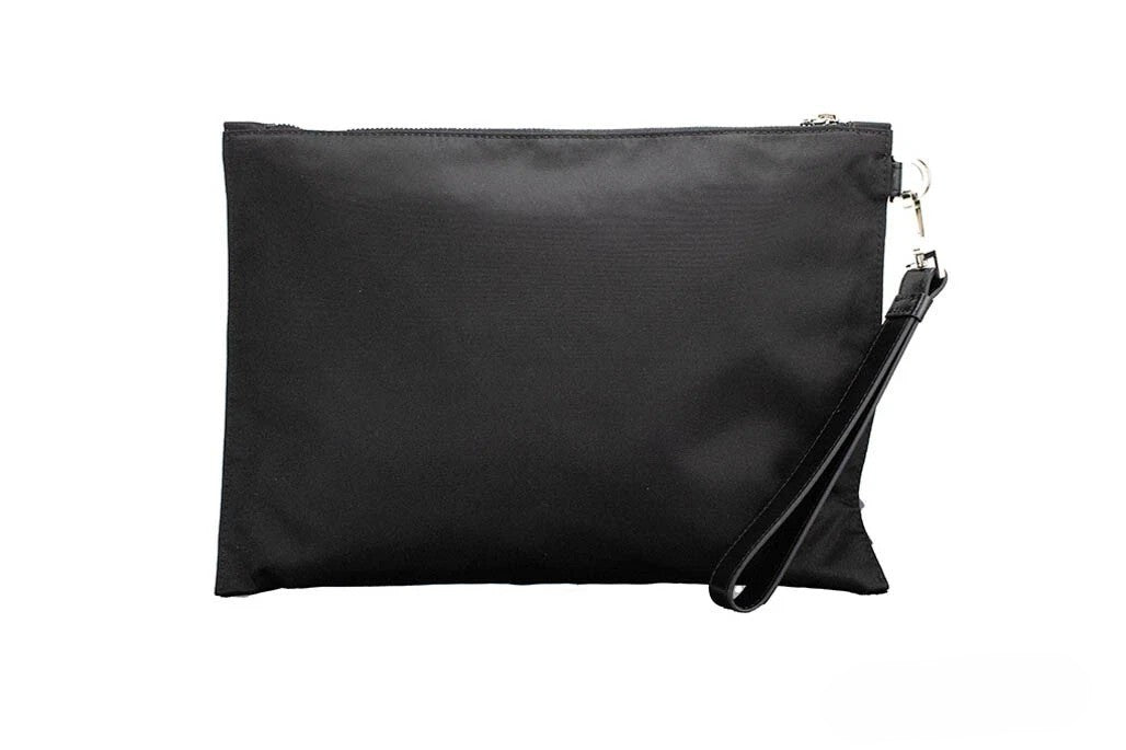 Discover the Versace Large Black Nylon Fabric Medusa Convertible Pouch, a masterpiece of elegance and versatility, perfect for those who appreciate luxury and sophistication.