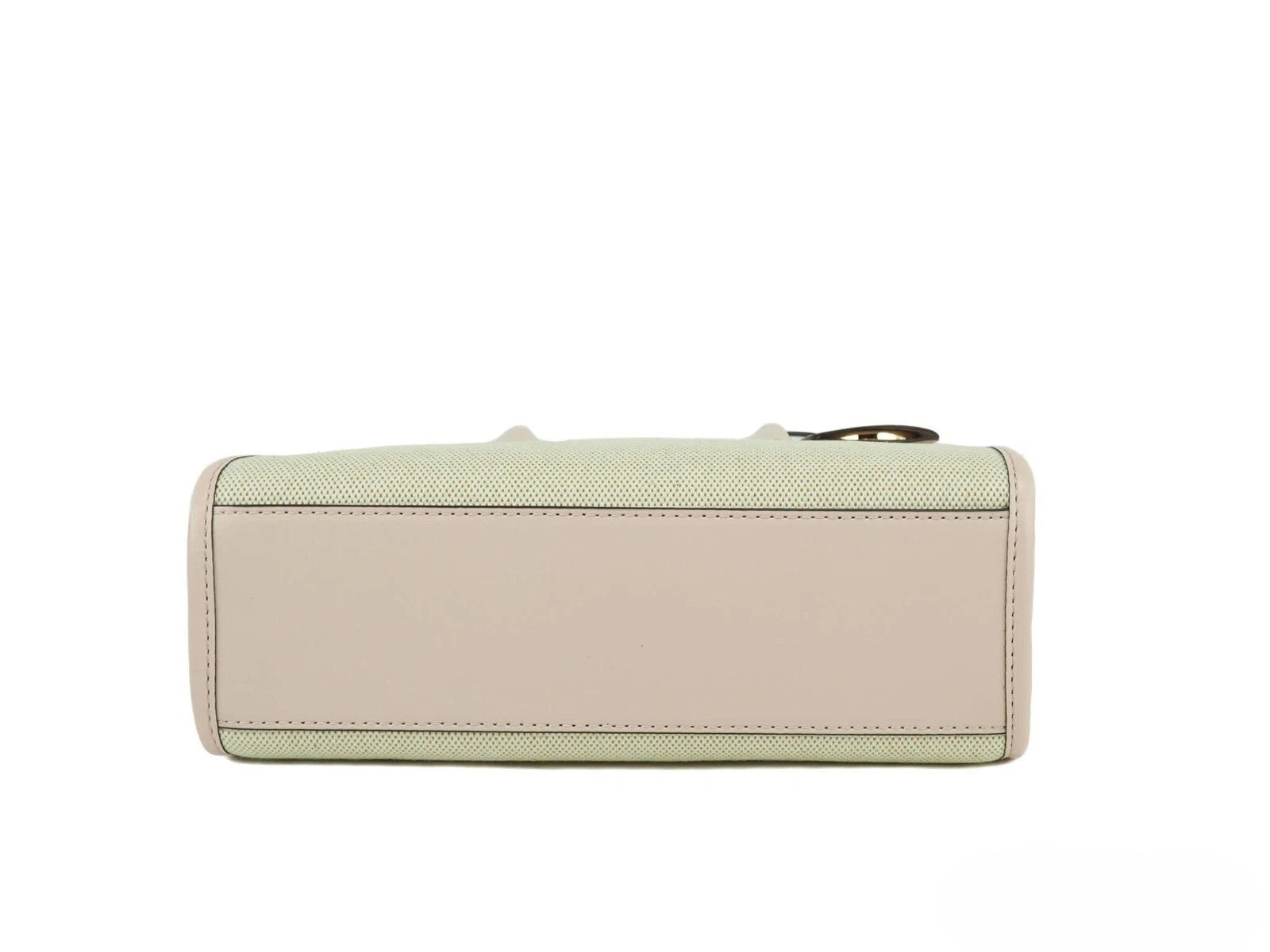 Elevate your style with the Michael Kors Mirella Small Powder Blush Canvas Shopper, a masterpiece of elegance and practicality, perfect for any sophisticated ensemble.