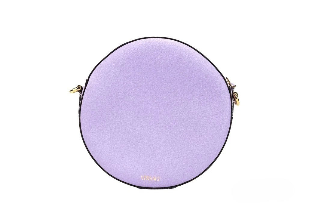 Elevate your style with the Versace Round Disco Lilac Pebbled Leather Camera Case, a luxurious blend of exquisite craftsmanship and timeless elegance, perfect for any occasion.