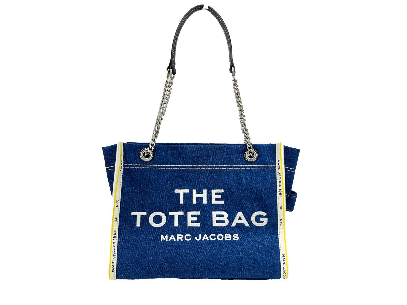 Elevate your style with the Marc Jacobs Denim Chain Medium Tote Bag, a luxurious blend of urban sophistication and timeless craftsmanship, perfect for any occasion.