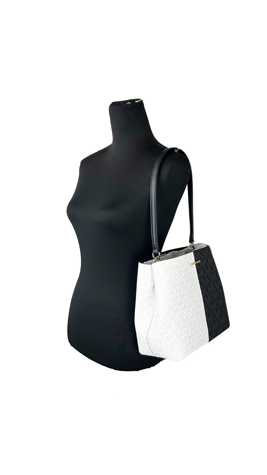 Discover the Michael Kors Medium Pratt Signature Bucket Bag, a blend of exquisite craftsmanship and contemporary elegance, perfect for the discerning individual seeking timeless luxury.