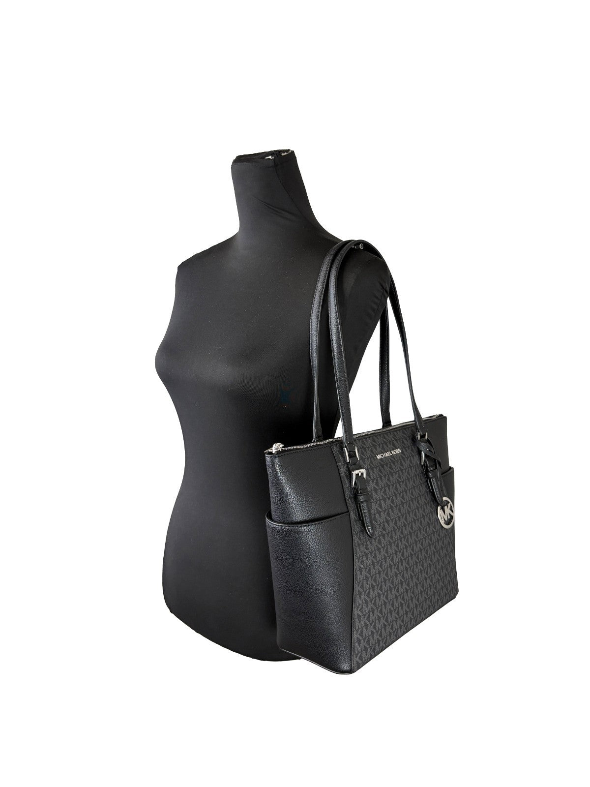Elevate your style with the Michael Kors Charlotte Leather Top Zip Tote Bag, a masterpiece of Saffiano leather that embodies luxury and sophistication for the discerning individual.