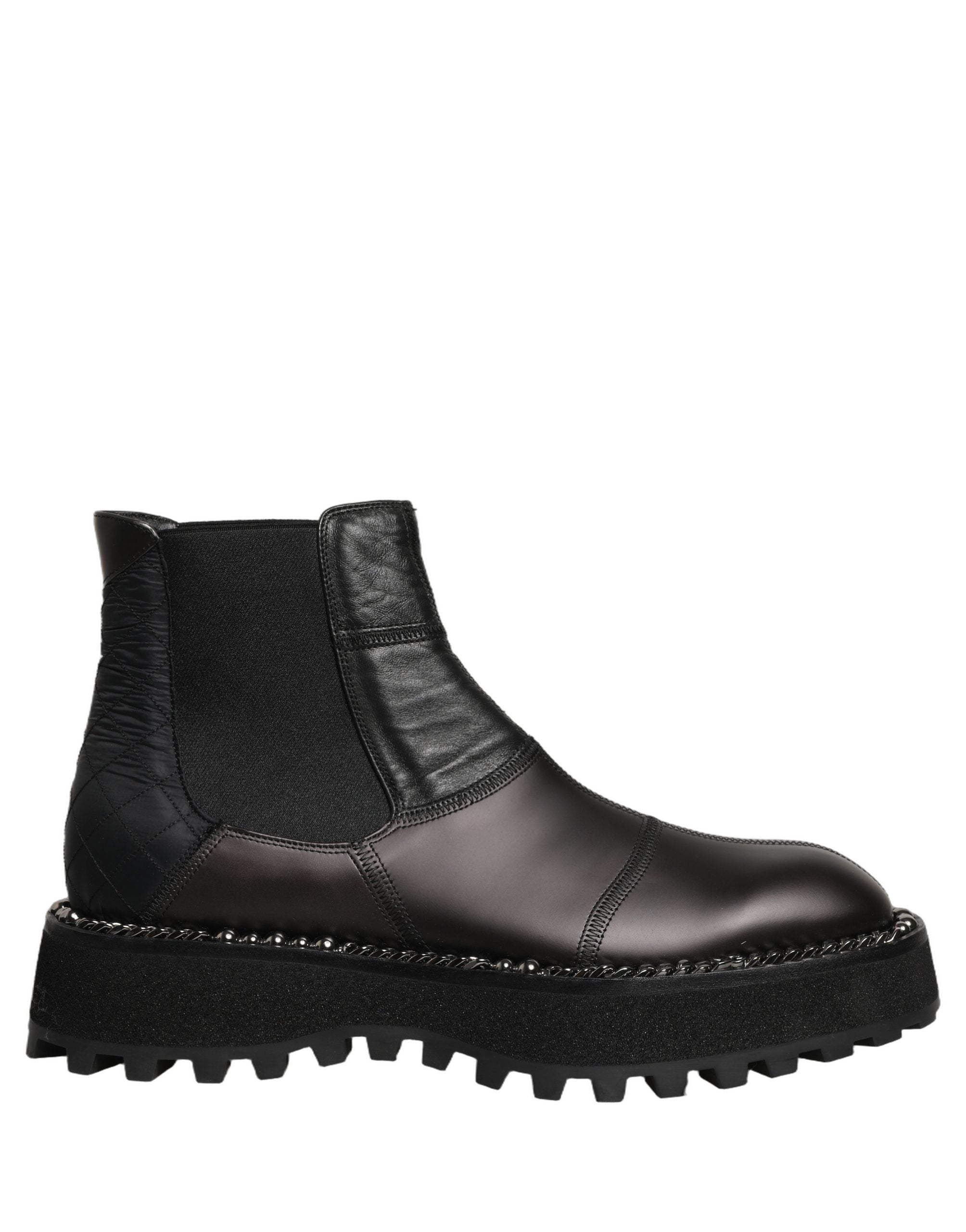 Experience the allure of Dolce & Gabbana Black Chelsea Boots, crafted from luxurious materials for a refined statement of elegance and sophistication in every step.