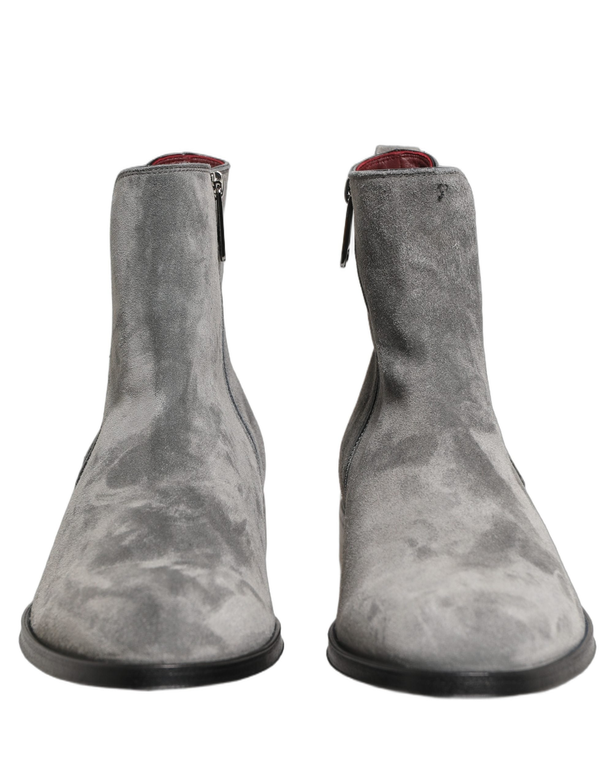 Step into unparalleled elegance with Dolce & Gabbana's Gray Suede Leather Chelsea Boots, a masterful blend of artisanal craftsmanship and luxurious materials, designed for the discerning individual.