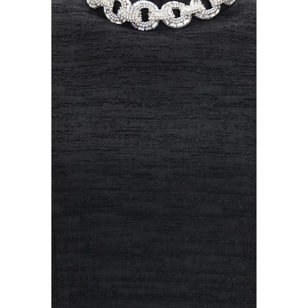 Experience the allure of the Valentino Black Cotton Casual Dress, where exquisite craftsmanship meets luxurious materials, perfect for any elegant occasion.