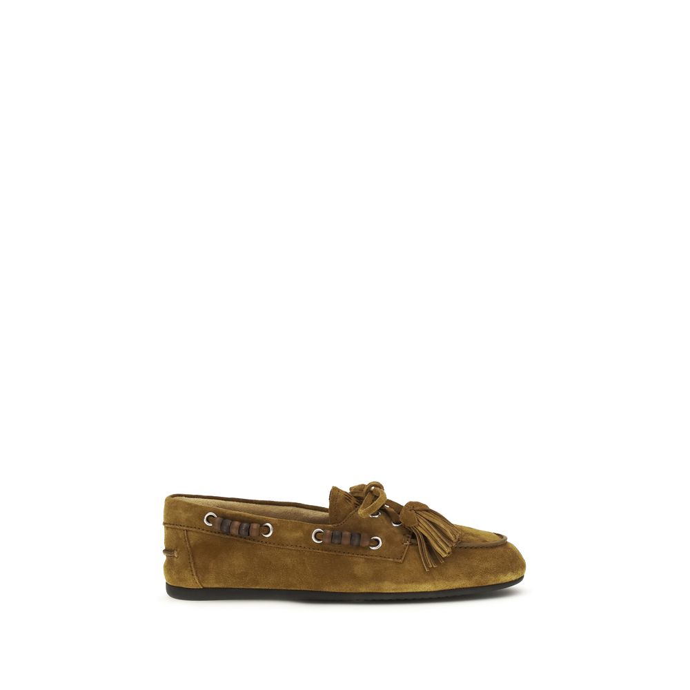 Experience the exquisite Miu Miu Beige Calf Leather Bos Taurus Slip-On Loafers, a testament to luxury craftsmanship and timeless elegance, perfect for any sophisticated occasion.