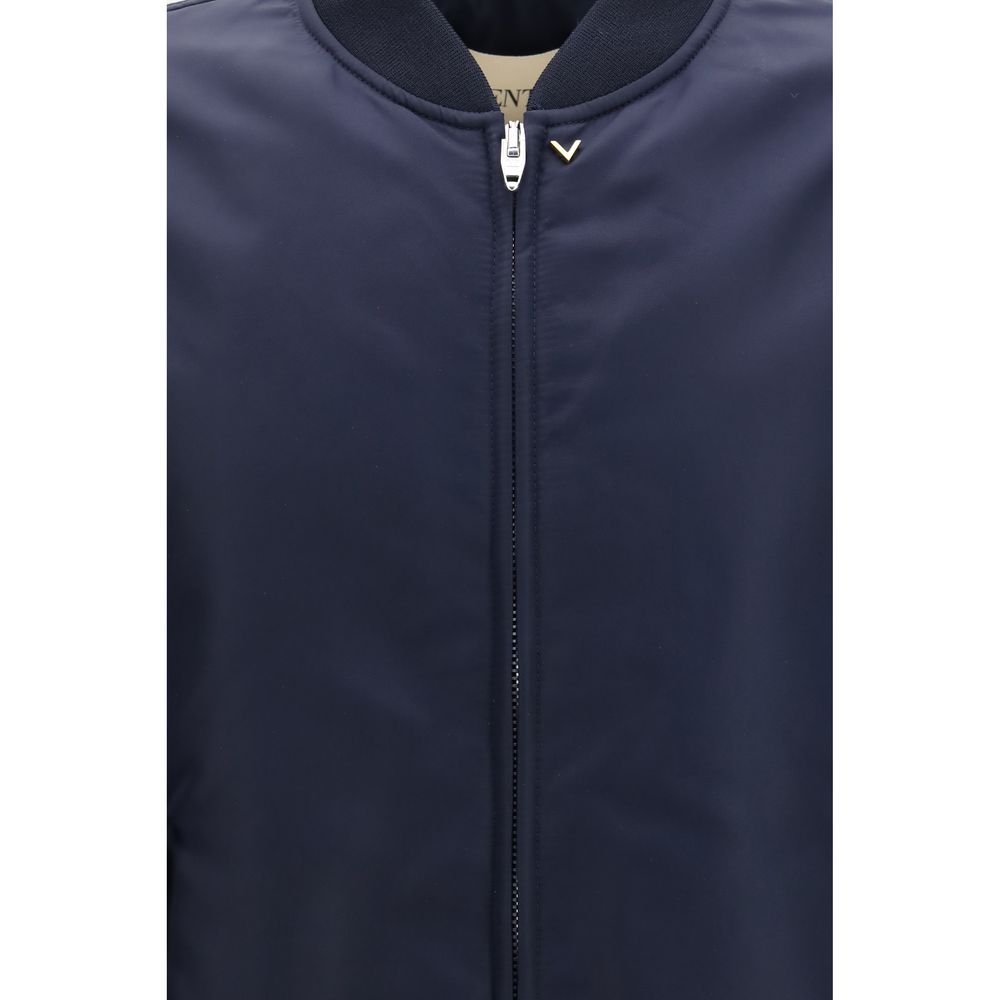 Elevate your wardrobe with the Valentino Blue Polyamide Bomber from the AW26 collection, a luxurious blend of contemporary design and exquisite craftsmanship.